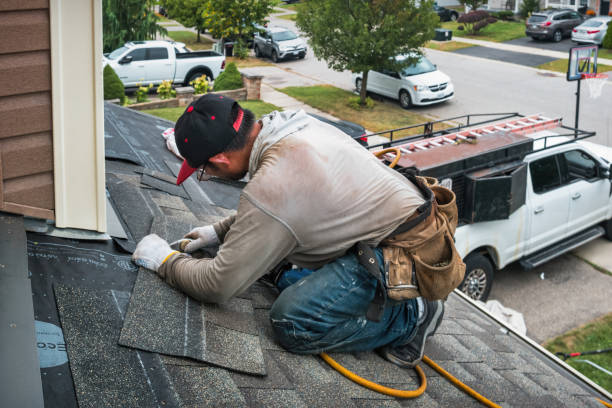 Professional Roofing technician working in Wanette, OK